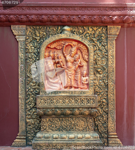 Image of Khmer style wall relief in Phnom Penh, Cambodia