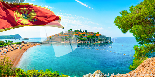 Image of Flag and beach at Sveti Stefan