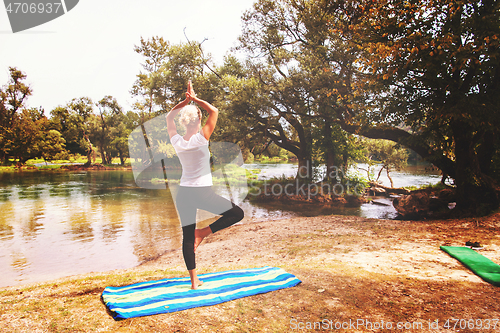 Image of woman meditating and doing yoga exercise