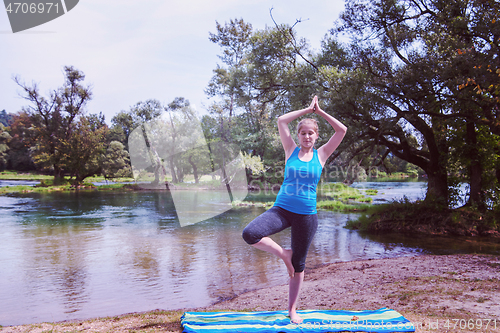 Image of woman meditating and doing yoga exercise