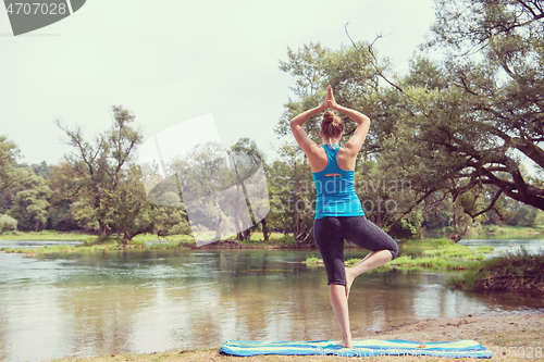 Image of woman meditating and doing yoga exercise