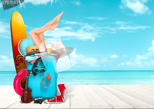 Image of Collage of luggage for travel in front of ocean view