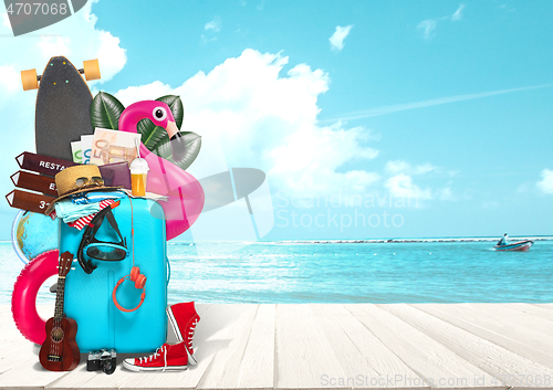 Image of Collage of luggage for travel in front of ocean view