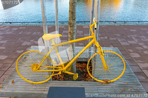 Image of Painted Yellow Bicycle