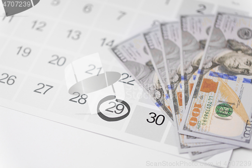 Image of black friday sale date on calendar and money