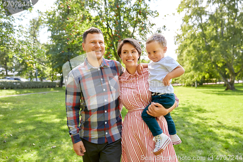 Image of happy family at summer park