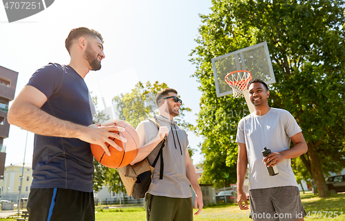 Image of group of male friends going to play basketball