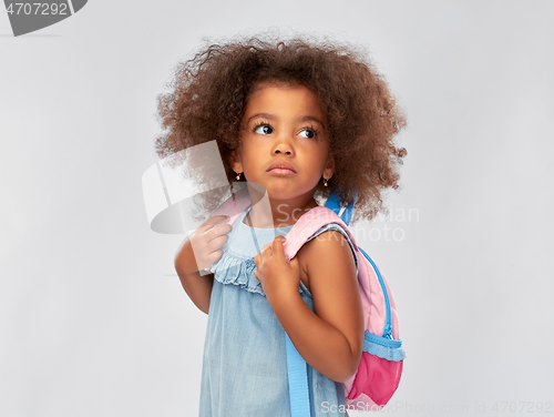 Image of sad little african american girl with backpack