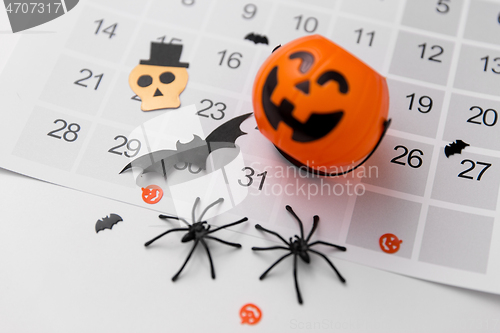 Image of halloween party decorations and calendar