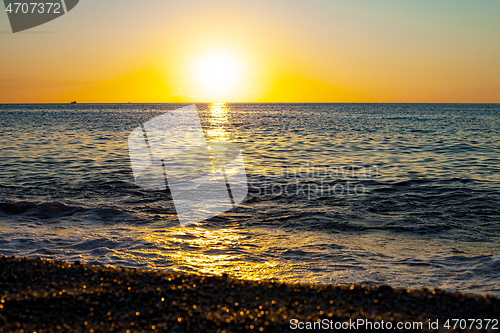 Image of Red sunset over the sea. Beautiful sunset.