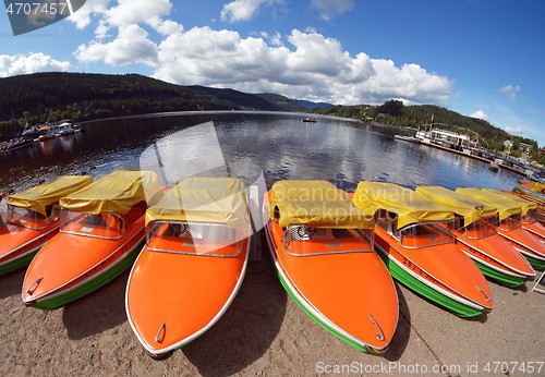 Image of Fisheye view of motor boats on the shore of Schluchsee lake in Germany