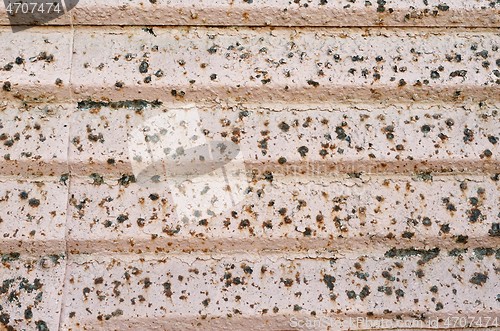 Image of Old rusty iron curtain of a closed shop