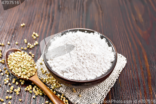 Image of Flour buckwheat green in bowl on board