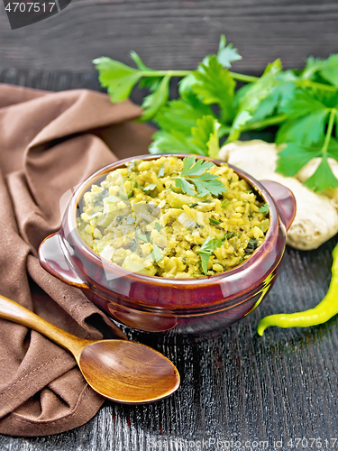 Image of Kitchari in bowl on dark wooden board