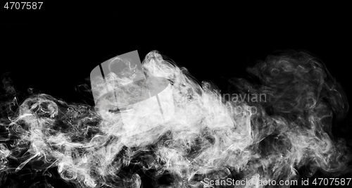 Image of Smoke over black background