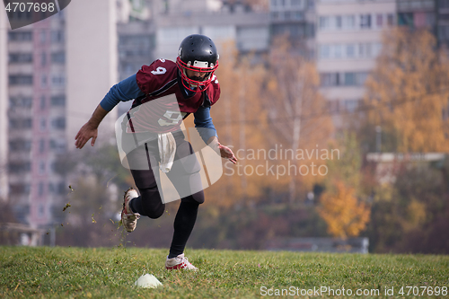 Image of american football player in action