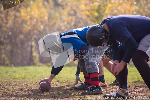 Image of american football team in action