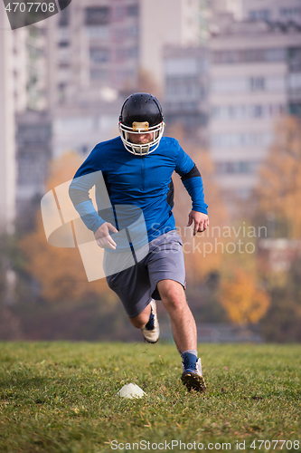 Image of american football player in action