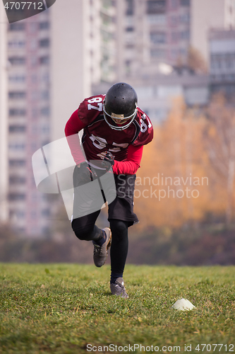 Image of american football player in action