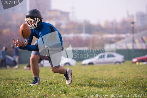 Image of american football team in action