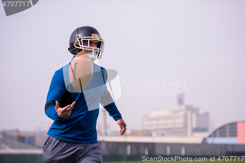 Image of american football player in action