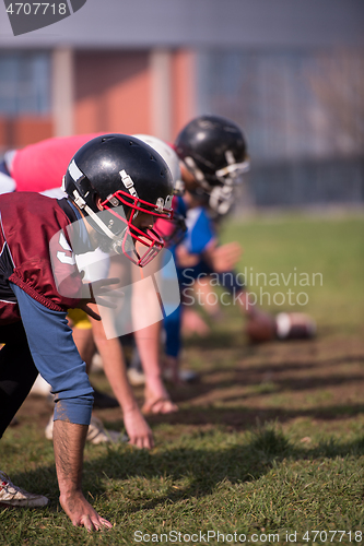 Image of american football team in action