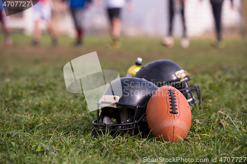 Image of American football helmets and ball