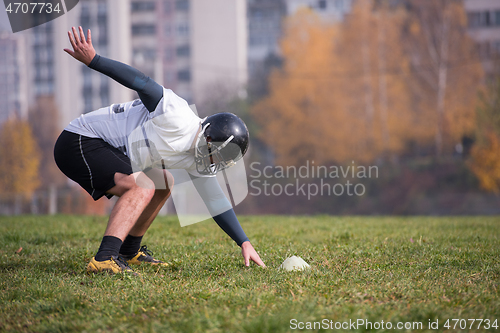 Image of american football player in action