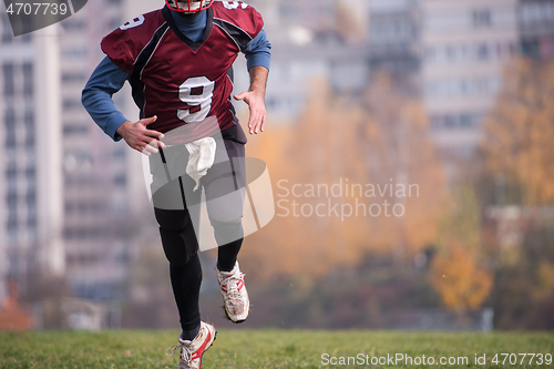 Image of american football player in action