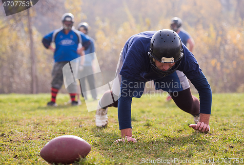 Image of american football player in action