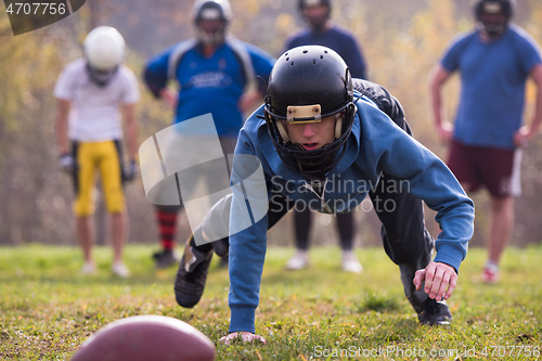 Image of american football player in action