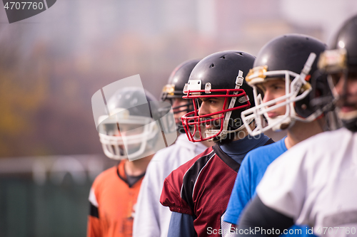 Image of portrait of young american football team