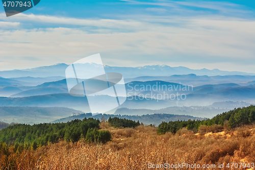 Image of Mountain Ranges in The Fog