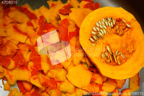 Image of peeled and cut hokkaido pumpkin while cooking