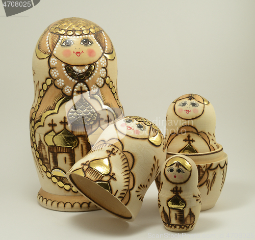 Image of traditional Russian nesting dolls on white