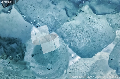 Image of Ice cubes as background texture closeup photo