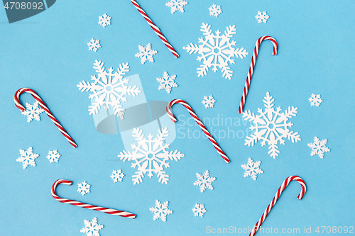 Image of snowflakes and candy cane decorations