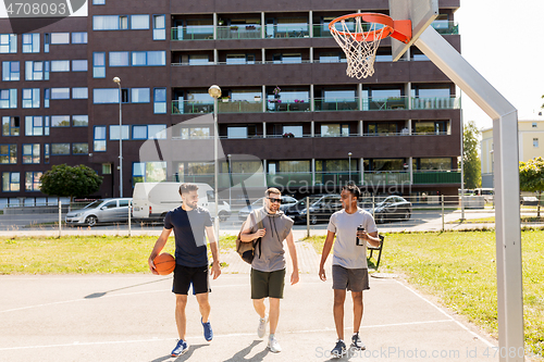 Image of group of male friends going to play basketball