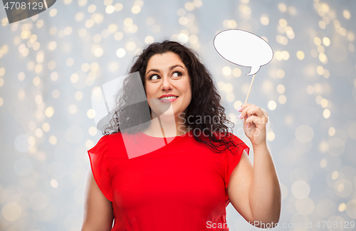 Image of happy woman in red dress holding speech bubble