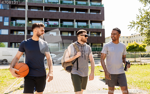 Image of group of male friends going to play basketball