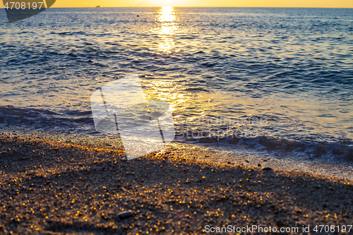 Image of Evening on the seaside. Beautiful sunset. T