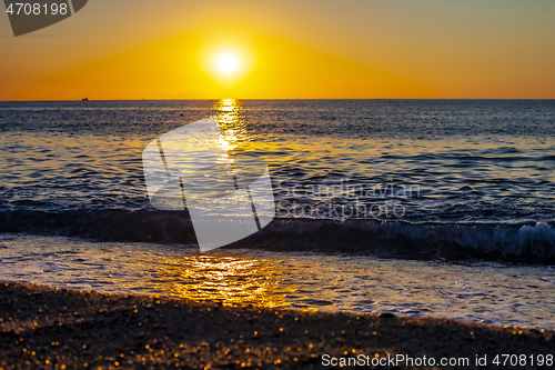 Image of Red sunset over the sea. Beautiful sunset.