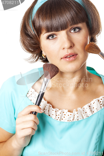 Image of Portrait of attractive brunet woman in blue dress with two make-