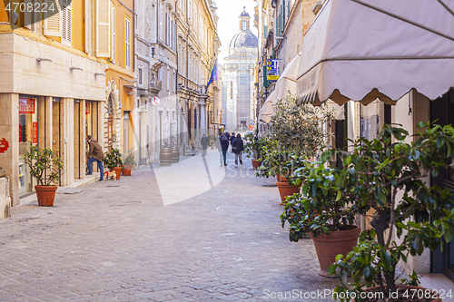 Image of Macerata, Italy - February 21, 2021: People enjoying sunny day.