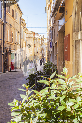 Image of Macerata, Italy - February 21, 2021: People enjoying sunny day.