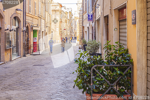 Image of Macerata, Italy - February 21, 2021: People enjoying sunny day.