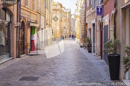 Image of Macerata, Italy - February 21, 2021: People enjoying sunny day.