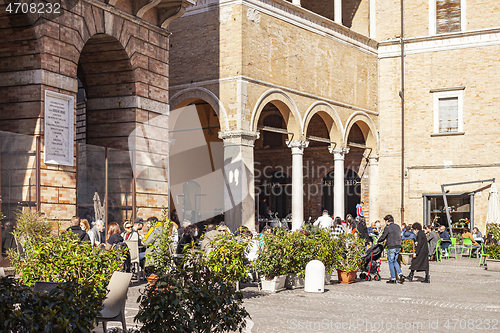 Image of Macerata, Italy - February 21, 2021: People enjoying sunny day.