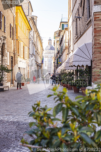 Image of Macerata, Italy - February 21, 2021: People enjoying sunny day.