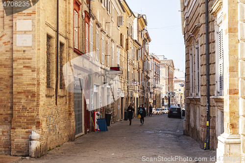 Image of Macerata, Italy - February 21, 2021: People enjoying sunny day.